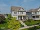 Charming two-story home with a welcoming front porch and beautifully landscaped yard at 12976 Walbeck Dr, Fishers, IN 46037