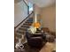 Inviting living area featuring a staircase, cozy seating, and stylish decor at 12976 Walbeck Dr, Fishers, IN 46037