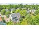 Aerial view of backyard with stone patio and outdoor dining area at 13304 Landwood Dr, Fishers, IN 46037