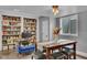 Finished basement with a home office and dining area with natural lighting at 13304 Landwood Dr, Fishers, IN 46037