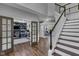 Open concept interior featuring office, staircase, and living room at 13304 Landwood Dr, Fishers, IN 46037