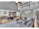 Open-concept living area showcasing a modern kitchen, spacious layout, and abundant natural light, ideal for Gathering living at 13304 Landwood Dr, Fishers, IN 46037