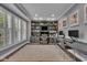 Home office featuring built-in shelves, work space, and natural light at 13304 Landwood Dr, Fishers, IN 46037