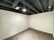 Basement with neutral walls, and carpet flooring offers a versatile space for various uses at 1429 Udell St, Indianapolis, IN 46208