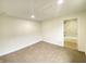 Inviting bedroom with plush carpeting, soft natural light, and a pristine en-suite bathroom for ultimate comfort at 1429 Udell St, Indianapolis, IN 46208