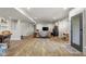 Spacious finished basement features multiple living areas, wood flooring, and recessed lighting at 1497 Maple Ridge Ct, Columbus, IN 47201