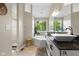 Bright bathroom featuring double vanity, soaking tub, and walk-in shower for a luxurious feel at 1497 Maple Ridge Ct, Columbus, IN 47201