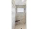 Spa-like shower with niche and mosaic accents at 1497 Maple Ridge Ct, Columbus, IN 47201