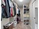 Spacious walk-in closet with custom shelving, providing ample storage for clothes and accessories at 1497 Maple Ridge Ct, Columbus, IN 47201