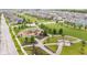 An aerial view of the community park with playground, walking paths, and gazebo providing relaxing space for residents at 1505 Avondale Dr, Westfield, IN 46074