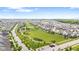 An aerial view of a beautiful community with a large green space and walking paths perfect for neighborhood enjoyment at 1505 Avondale Dr, Westfield, IN 46074