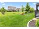 Large well-manicured back yard and lawn with lovely landscaping at 1505 Avondale Dr, Westfield, IN 46074
