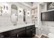 Bathroom featuring double sinks, white countertops, and stylish fixtures at 1505 Avondale Dr, Westfield, IN 46074