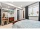 Inviting bedroom featuring a comfortable bed, a window, and an ensuite at 1505 Avondale Dr, Westfield, IN 46074