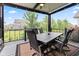 Relaxing covered deck with ceiling fan and scenic backyard view at 1505 Avondale Dr, Westfield, IN 46074