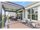 Stylish deck with seating area, dining table, and access to the backyard at 1505 Avondale Dr, Westfield, IN 46074