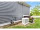 Home exterior featuring gas meter and backup generator at 1505 Avondale Dr, Westfield, IN 46074