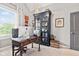 Bright office with a large window, dark shelves and decorative accents at 1505 Avondale Dr, Westfield, IN 46074