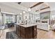 Kitchen offers granite countertops, stainless appliances, and is open to the dining and living area at 1505 Avondale Dr, Westfield, IN 46074