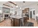 Open concept kitchen flows into the living room, with a large island and modern appliances at 1505 Avondale Dr, Westfield, IN 46074
