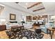 Spacious living area showcasing an open layout with hardwood floors and a seamless transition to the kitchen at 1505 Avondale Dr, Westfield, IN 46074