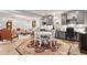 Open-concept living space with dining area, cozy seating, and integrated kitchenette at 1505 Avondale Dr, Westfield, IN 46074