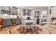 Stylish living space featuring a dining table, kitchenette, and cozy seating arrangement at 1505 Avondale Dr, Westfield, IN 46074