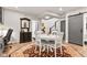 Charming living space featuring a dining table, kitchenette, and a sliding barn door at 1505 Avondale Dr, Westfield, IN 46074