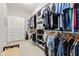 Organized walk-in closet with ample shelving and storage solutions for clothes and accessories at 1505 Avondale Dr, Westfield, IN 46074