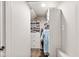 Bright walk-in closet boasts custom shelving and drawers for optimal organization and tidy storage at 1505 Avondale Dr, Westfield, IN 46074