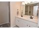Bathroom featuring a double sink vanity, a large mirror, and neutral paint at 15524 Follow Dr, Noblesville, IN 46060