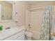 The full bathroom offers a shower and tub combination with white cabinets and neutral colors at 15524 Follow Dr, Noblesville, IN 46060