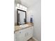 Cozy half bathroom featuring a single sink vanity with neutral countertop and framed mirror at 15524 Follow Dr, Noblesville, IN 46060