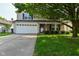 Inviting exterior view of a two-story home with an attached garage, showcasing its well-kept lawn and inviting facade at 15524 Follow Dr, Noblesville, IN 46060