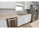 The kitchen has stainless steel appliances, a double sink, and ample counter space at 15524 Follow Dr, Noblesville, IN 46060