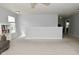Bright and airy living space with neutral walls, carpet flooring, and a comfortable seating area at 15524 Follow Dr, Noblesville, IN 46060