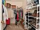 Well-organized walk-in closet featuring clothing racks, shelving, and shoe storage at 15524 Follow Dr, Noblesville, IN 46060