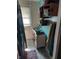 A bathroom featuring a sink, curtained tub, and a window at 1617 Blaine Ave, Terre Haute, IN 47804