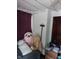 Bedroom showcasing plush stuffed animals on the bed, cozy lighting, and charming details at 1617 Blaine Ave, Terre Haute, IN 47804