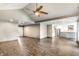 Open floor plan connecting the living room to the modern kitchen with updated appliances at 1663 Cloister Dr, Indianapolis, IN 46260