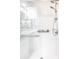 Modern walk-in shower featuring sleek glass doors and contemporary fixtures at 1663 Cloister Dr, Indianapolis, IN 46260
