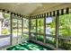 Sunroom with panoramic view of the lake at 1663 Cloister Dr, Indianapolis, IN 46260