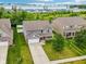 Aerial view of a well-maintained home and lawn with mature trees in a quiet suburban neighborhood at 1739 Wedgewood Pl, Avon, IN 46123