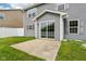 Backyard featuring a patio, sliding glass door and green grass at 1739 Wedgewood Pl, Avon, IN 46123