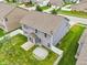 Aerial view of backyard with privacy fence, green lawn, and sliding glass door entry at 1739 Wedgewood Pl, Avon, IN 46123