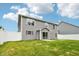 Backyard with a white fence, green grass, and a view of the home at 1739 Wedgewood Pl, Avon, IN 46123