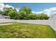 Fenced backyard with lush green grass and privacy at 1739 Wedgewood Pl, Avon, IN 46123