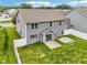 Aerial view of a home with a fenced backyard, patio area, and well-maintained lawn at 1739 Wedgewood Pl, Avon, IN 46123