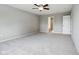 Spacious bedroom features a ceiling fan and entrance to another room at 1739 Wedgewood Pl, Avon, IN 46123