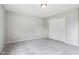 Bedroom with carpet, neutral walls, and a closet with double doors at 1739 Wedgewood Pl, Avon, IN 46123